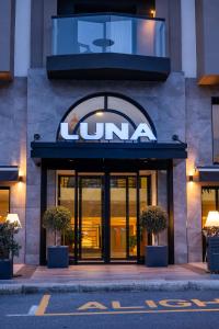 a jumeirah sign on the front of a building at Luna Holiday Complex in Mellieħa