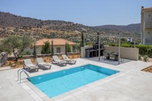 Φωτογραφία από το άλμπουμ του Ioanna - Utopia Luxury Villa with Private Pool στις Γούβες +34 φωτογραφίες