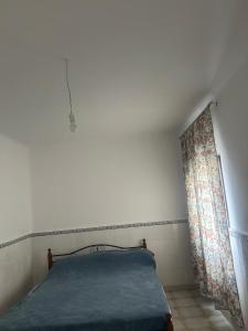 Postel nebo postele na pokoji v ubytování Maison vue sur mer