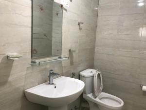 a bathroom with a sink and a toilet at Fair Field Bungalow in Nuwara Eliya +37 photos