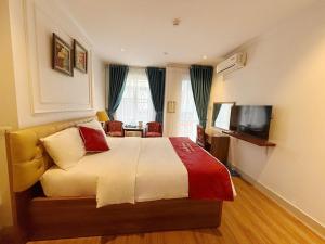 TV in/ali zabaviščno središče v nastanitvi New Amely Hotel
