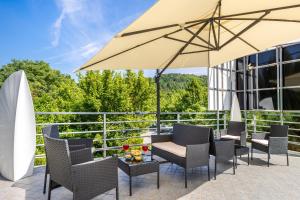 Balkón nebo terasa v ubytování Aston Hotel