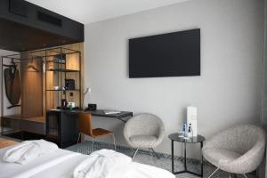 Postel nebo postele na pokoji v ubytování Q Hotel Plus Wrocław