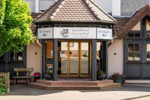a building with a sign that reads laminated geometry at Landhotel Georgshof in Hünfeld +49 photos