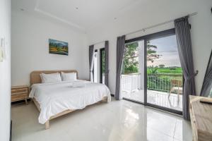Кровать или кровати в номере Private 2BR Villa in Canggu