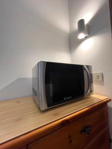 TV a/nebo společenská místnost v ubytování Rifugetto