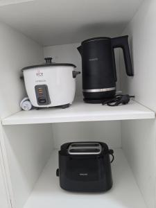 Cucina o angolo cottura di Cosy Homes in Suva - Home That Hugs You!