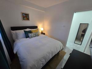 Letto o letti in una camera di Cosy Homes in Suva - Home That Hugs You!