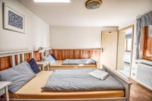 Postel nebo postele na pokoji v ubytování Resort Zajíci ze Zaječí