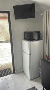 Kuchyň nebo kuchyňský kout v ubytování Ardkeen-Outhouse