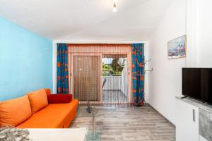 Apartments Mimiにあるテレビまたはエンターテインメントセンター