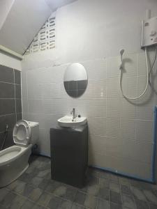 Koupelna v ubytování Capricorn hostel Yaowarat + 5 fotografií