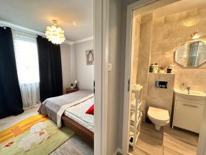 Postel nebo postele na pokoji v ubytování Centrum Pańska3 Apartment PARKING