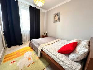 Postel nebo postele na pokoji v ubytování Centrum Pańska3 Apartment PARKING