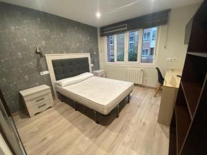 Posteľ alebo postele v izbe v ubytovaní Residencia Compostela