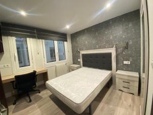 Posteľ alebo postele v izbe v ubytovaní Residencia Compostela