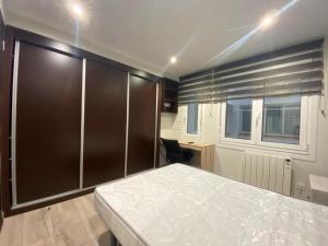 Posteľ alebo postele v izbe v ubytovaní Residencia Compostela