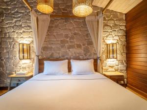 Postel nebo postele na pokoji v ubytování Kimera Lounge Boutique Hotel & Spa