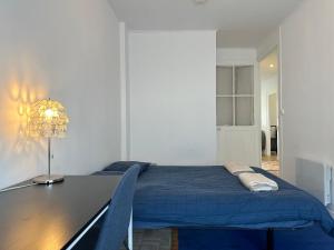 Postel nebo postele na pokoji v ubytování Appartement avec balcon 4 pers