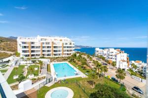 an aerial view of a resort with a swimming pool at Luxury Rooftop Isea 1132 by Casasol in Torrox Costa +33 photos