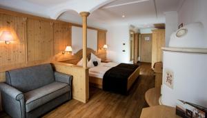 Postel nebo postele na pokoji v ubytování Hotel Dorfer Alpine&Charming