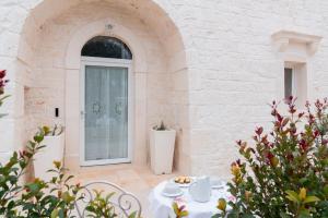 Patio nebo venkovní prostory v ubytování Apulian Charme Trulli and Cottage