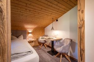 Voodi või voodid majutusasutuse Pension Edelweiss toas