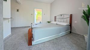 Postel nebo postele na pokoji v ubytování Elysian Suites 1ST Floor N3