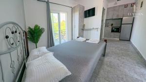 Kuchyň nebo kuchyňský kout v ubytování Elysian Suites 1ST Floor N3