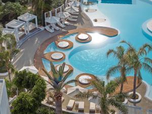 The swimming pool at or close to Caramel, A Grecotel Resort to Live