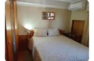 Postel nebo postele na pokoji v ubytování Apartamento na Beira-mar em Fortaleza