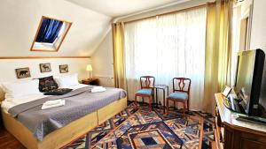 Μια τηλεόραση ή/και κέντρο ψυχαγωγίας στο Casa Vanatorului