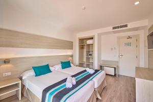 Postel nebo postele na pokoji v ubytování Welikehotel Fenix