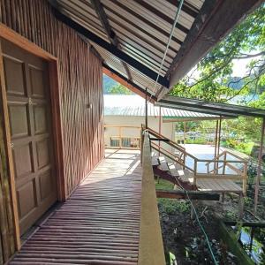 Balkón nebo terasa v ubytování Kinabalu Poring Vacation Lodge + 13 fotografií