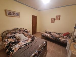 Postel nebo postele na pokoji v ubytování Casa Sionna