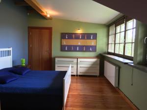 Postel nebo postele na pokoji v ubytování Ulinia Gardens