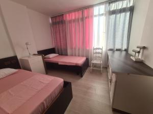 Postel nebo postele na pokoji v ubytování ART Apartment Durres Albania