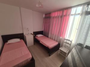 Postel nebo postele na pokoji v ubytování ART Apartment Durres Albania