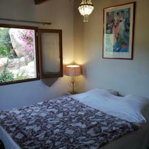 Postel nebo postele na pokoji v ubytování L'Alivettu