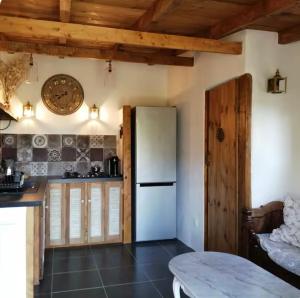 Kuchyň nebo kuchyňský kout v ubytování L'Alivettu