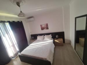 Postel nebo postele na pokoji v ubytování ART Apartment Durres Albania
