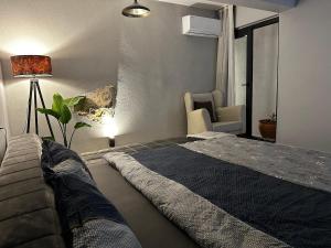 Katil atau katil-katil dalam bilik di Welcome to the Paradise of the Aegean