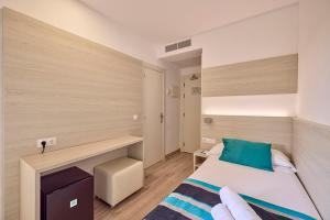 Postel nebo postele na pokoji v ubytování Welikehotel Fenix