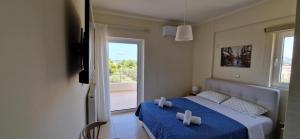Postel nebo postele na pokoji v ubytování Hermes House