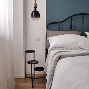 Ένα ή περισσότερα κρεβάτια σε δωμάτιο στο Nine and Three Quarters Rooms