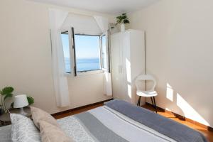 Ένα ή περισσότερα κρεβάτια σε δωμάτιο στο Casa Marzoa +2 φωτογραφίες