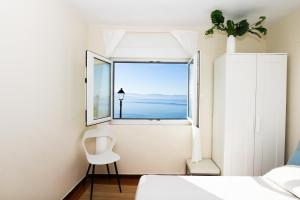 Ένα ή περισσότερα κρεβάτια σε δωμάτιο στο Casa Marzoa