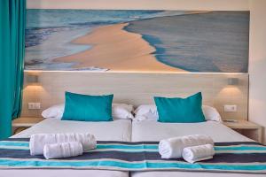 Postel nebo postele na pokoji v ubytování Welikehotel Fenix