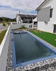 Πισίνα στο ή κοντά στο Aruna Retreat Rawang