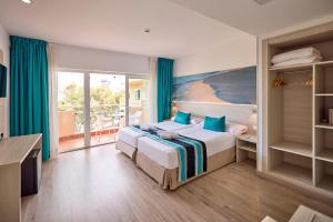 Postel nebo postele na pokoji v ubytování Welikehotel Fenix